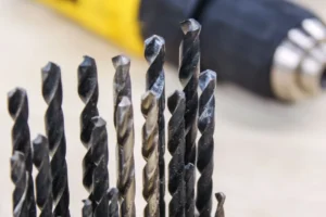 Carving drill bit